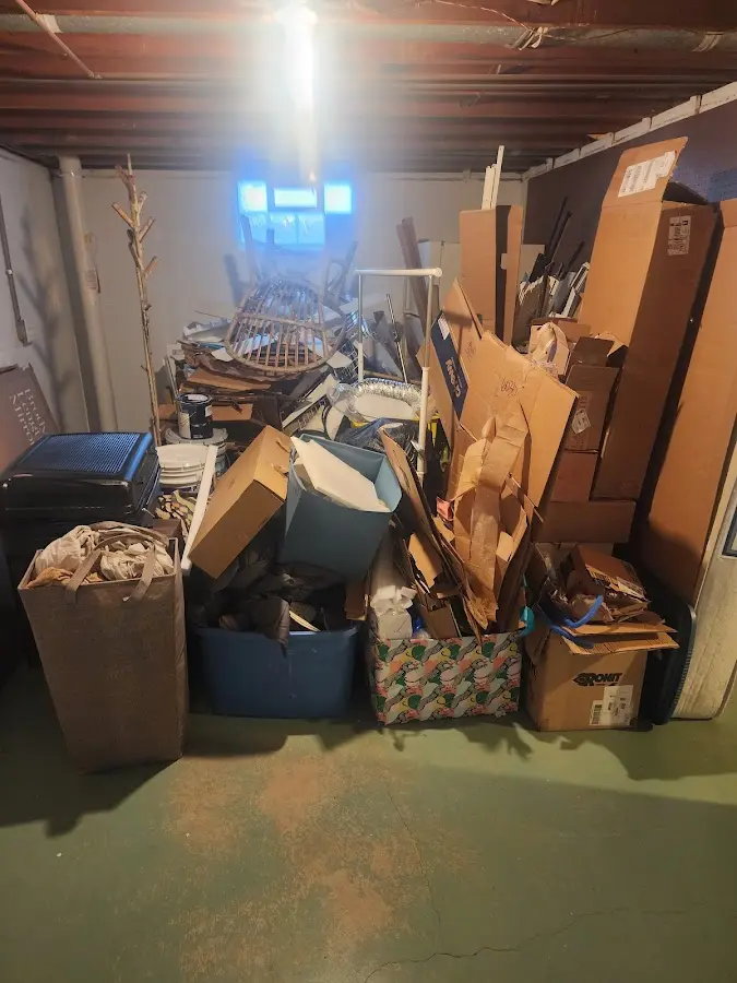 Roll-off dumpster container at job site for 6 Yard Dumpster Rental in Callicoon